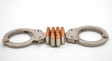Bullets and cuffs