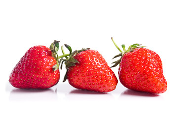 red strawberry fruits isolated on white background