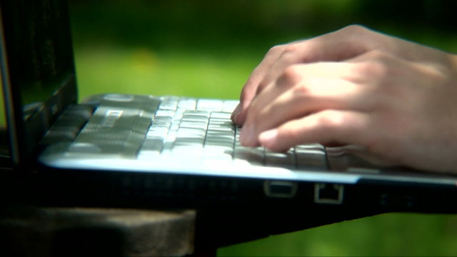 Typing on Laptop