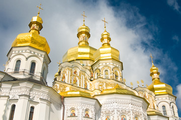Fototapeta na wymiar Cloudy sky and Cupola of Orthodox church