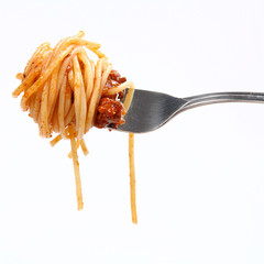 Spaghetti with sauce bolognese hanging on a fork