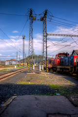 Fototapeta na wymiar Electricity Pylons At The End Of Railroad Platform