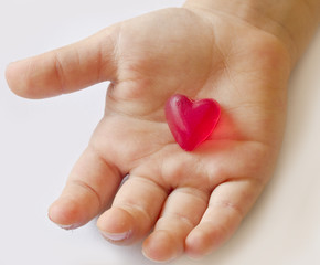 little heart in the chlid's hand