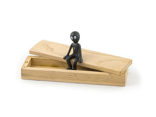 Black man seat on wood box