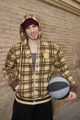 grunge basket ball street player on brickwall