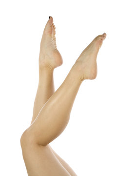Womans legs toes up in the air