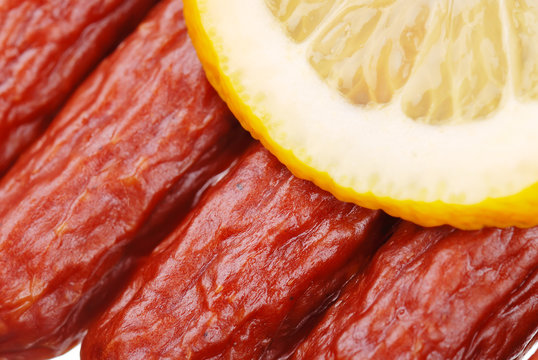 The tasty sausages with lemon
