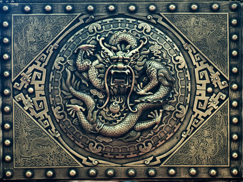 Fototapeta chinese dragon bas-relief on metall plate