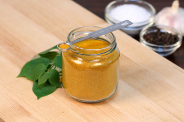 curry powder on fine wood cutting board