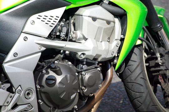 Motorbike engine of a modern powerful green sports motorcycle