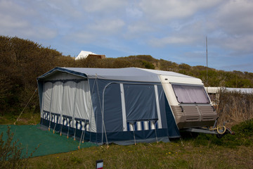 Fototapeta na wymiar a caravan on a dutch camping