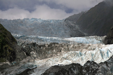 Hikers on ice falls on Franz Joseph Glacier