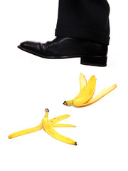 businessman shoe steping a banana