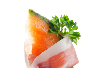 slice of parma ham with melon