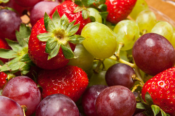 Fresh strawberries and grapes