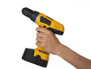 Battery drill in left hand