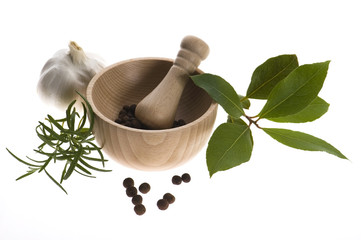 Mortar and pestle, with fresh-picked herbs