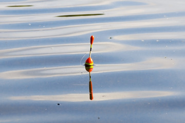 Just Fishing - Cork Floating on Calm Lake