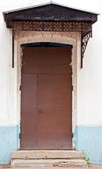 Obraz na płótnie Canvas Brown metal door