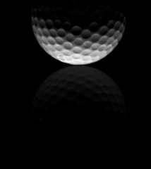 Golf ball closeup in black and white