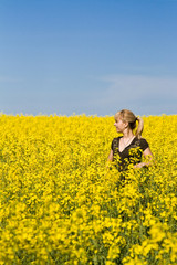 woman in a field of wildflowers