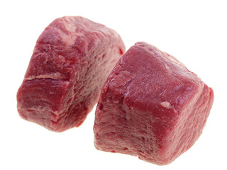 raw beef tenderloin steaks isolated on white background