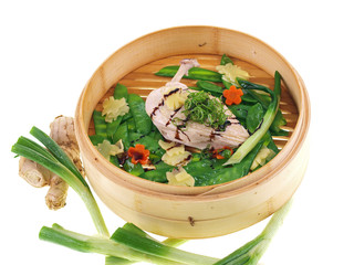ginger chicken, vegetables & soy sauce in bamboo steamer