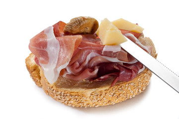 slice bread with parma ham and grana and dried fig snack