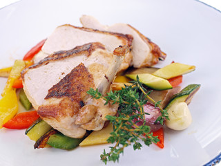 grilled chicken & mediterranean vegetables isolated on white