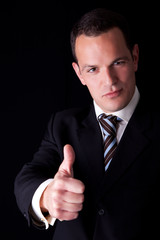 businessman giving consent, with thumb up