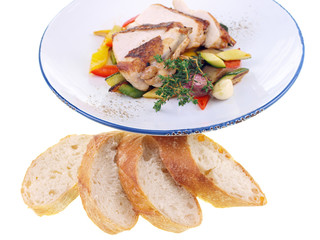 grilled chicken & mediterranean vegetables isolated on white