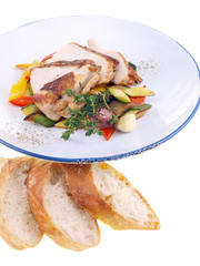 grilled chicken & mediterranean vegetables isolated on white