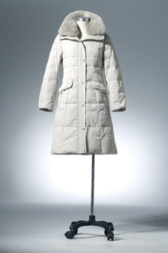 winter coat dress on mannequin
