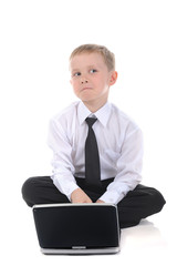 Little businessman with a laptop