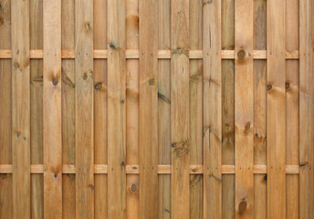 New painted wooden fence made of pine