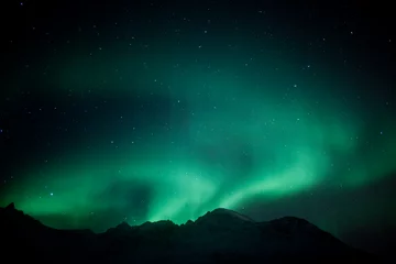 Fotobehang Aurora Borealis buiten Tromso, Noorwegen © jamenpercy
