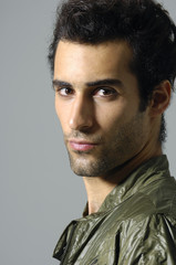 Obraz premium Close up portrait of young serious man