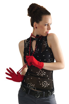 woman in red beads and gloves