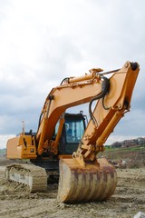 Excavator standing in the construction site