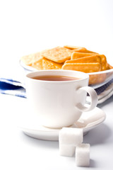 cup of tea, sugar and cookies