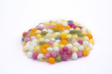 white chocolate button with sprinkles