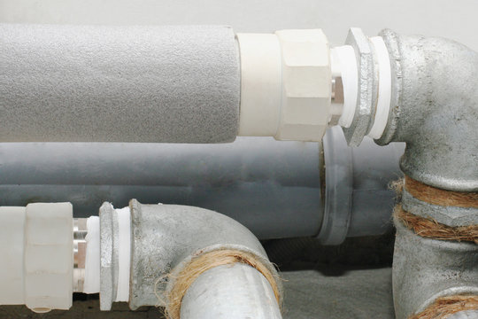 Metal and plastic pipe are conected