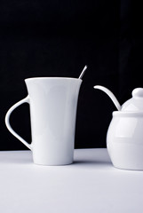 Coffee cup and sugar