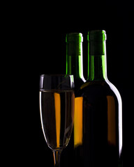 Old wine. Still life over black background