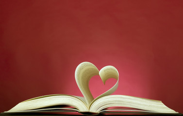 Opened book and heart shape