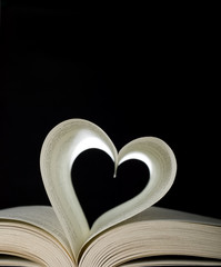 Opened book and heart shape
