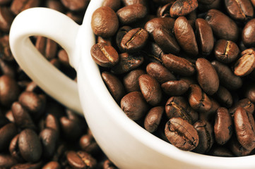 Coffee beans and cup