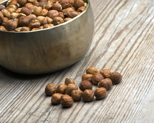 Hazelnuts In Brass Bowl