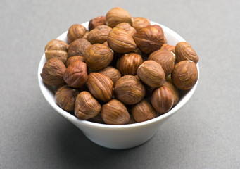 Hazelnuts In White Dish
