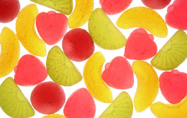 Fruit candies on a white background.
